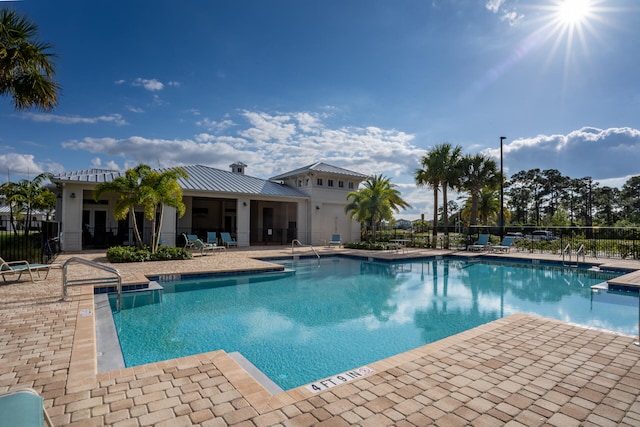 view of pool featuring a patio area