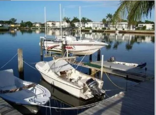 dock area featuring a water view