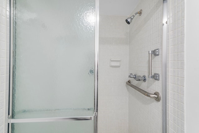 bathroom featuring an enclosed shower