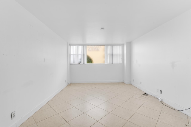 view of tiled spare room