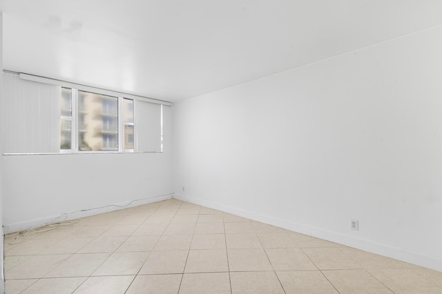 view of tiled spare room