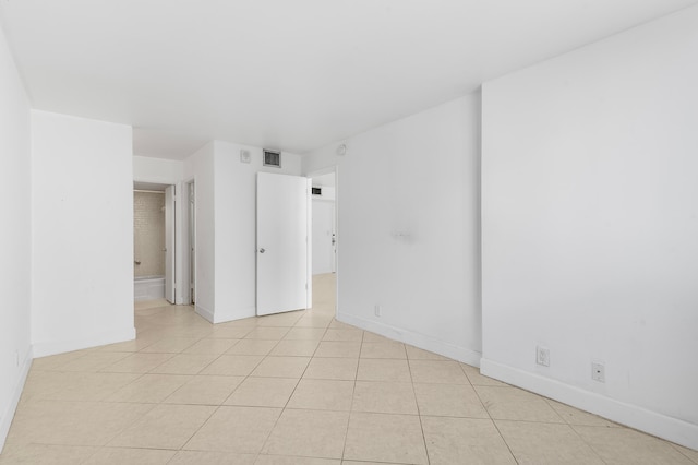 view of tiled spare room