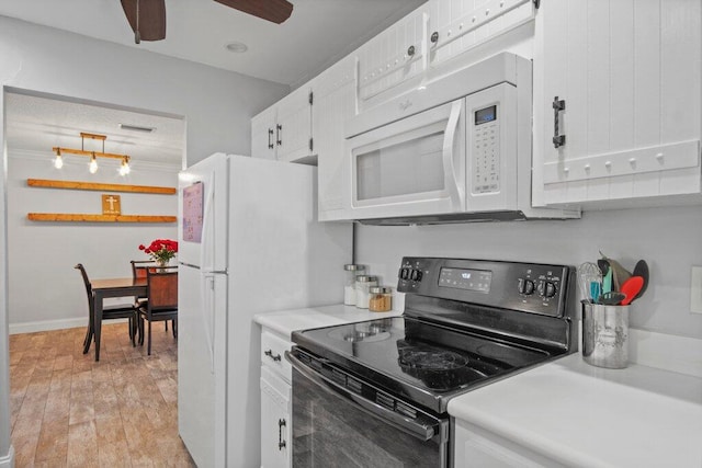 kitchen featuring light wood-type flooring, ceiling fan, white appliances, and white cabinets