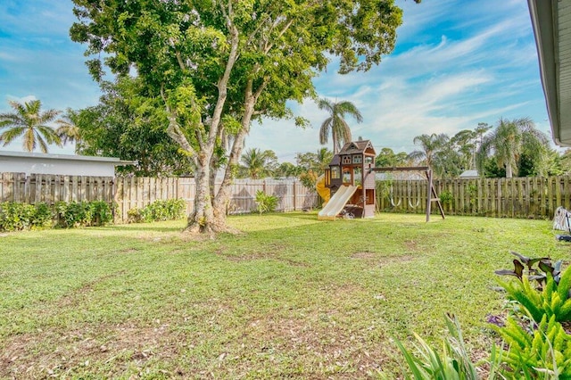 view of yard with a playground