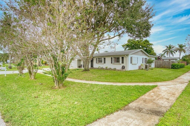 ranch-style house with a front yard