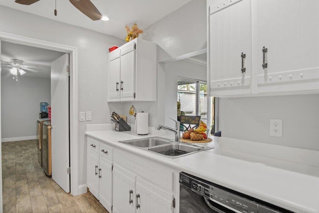 kitchen with dishwasher, light hardwood / wood-style flooring, sink, and white cabinetry