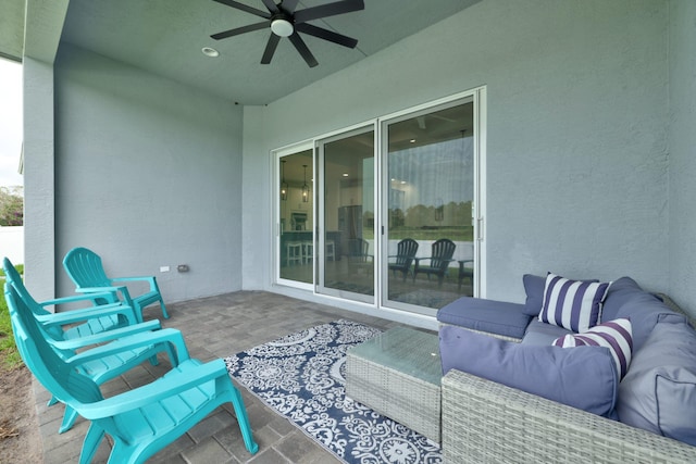 view of patio / terrace featuring ceiling fan