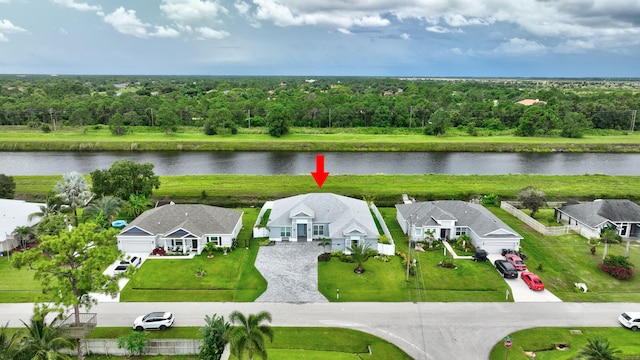 drone / aerial view with a water view