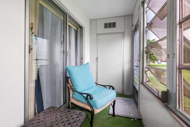 sunroom with a healthy amount of sunlight