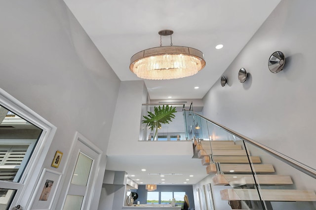 entryway featuring a high ceiling and hardwood / wood-style floors