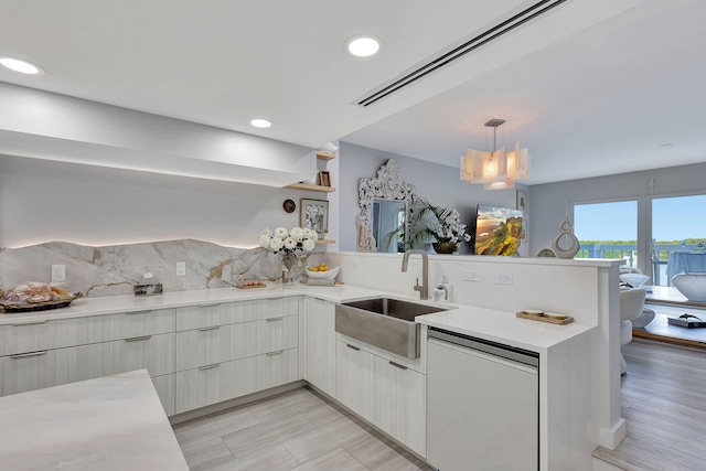 kitchen featuring white refrigerator, black range oven, and tasteful backsplash