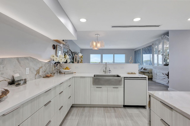 kitchen with light wood-type flooring, stainless steel electric range, and light stone counters