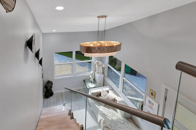 living room with light hardwood / wood-style floors and sink