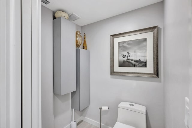 bathroom with tile walls and a tub