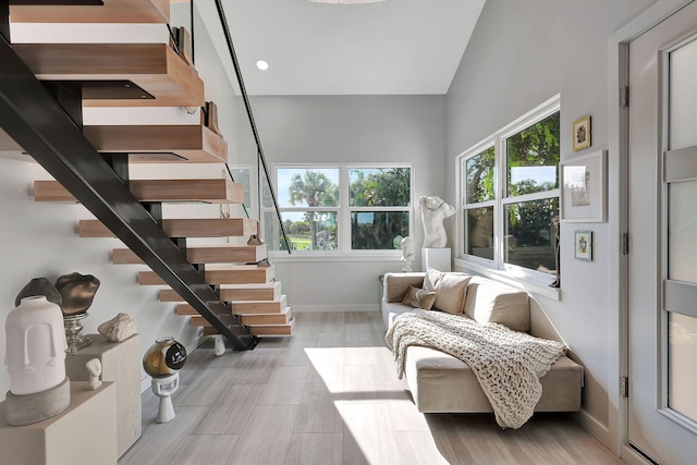 stairs with wood-type flooring