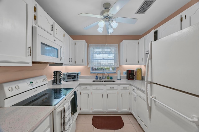 kitchen featuring white cabinets, white appliances, ceiling fan, and sink