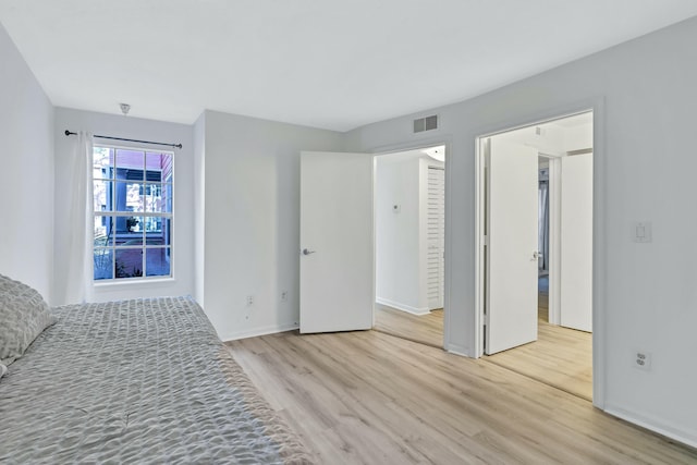 unfurnished bedroom featuring light hardwood / wood-style flooring