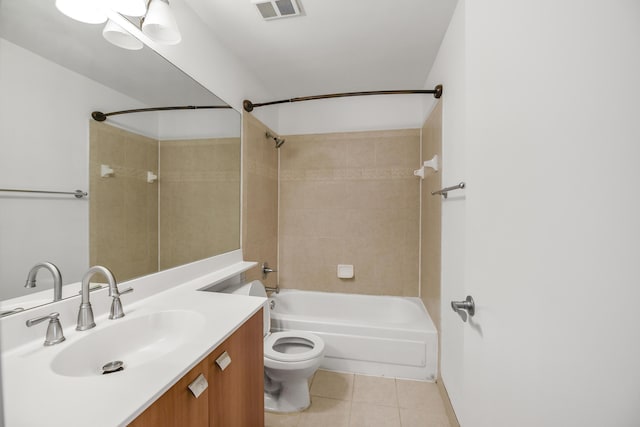 full bathroom with tile patterned floors, vanity, toilet, and tiled shower / bath