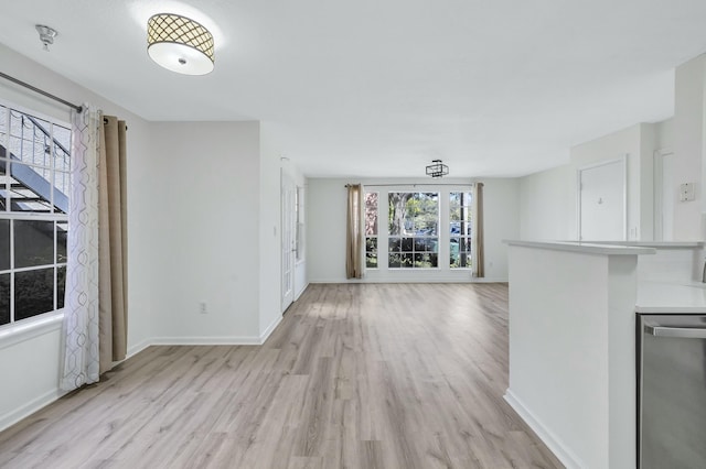 unfurnished living room featuring light wood-type flooring