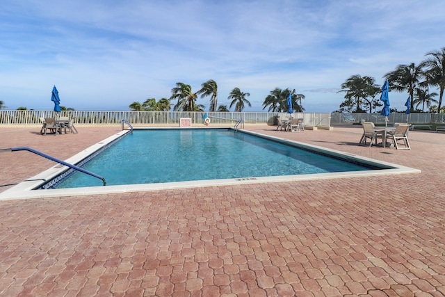 view of pool featuring a patio area