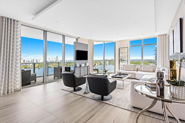 living room featuring a wall of windows