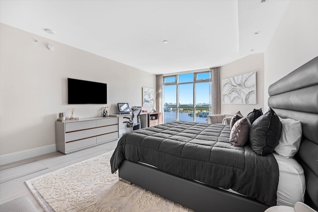 bedroom featuring light wood-type flooring