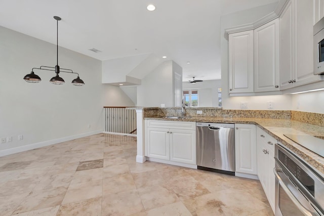 kitchen with sink, white cabinetry, kitchen peninsula, hanging light fixtures, and stainless steel appliances