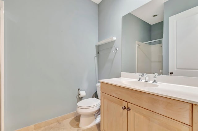 bathroom featuring a shower, tile patterned flooring, vanity, and toilet