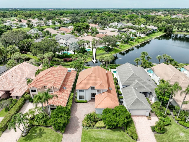 bird's eye view with a water view