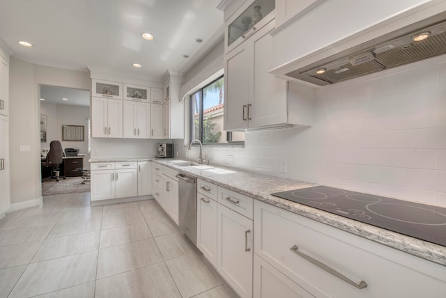 kitchen featuring light stone counters, white cabinets, sink, extractor fan, and dishwasher