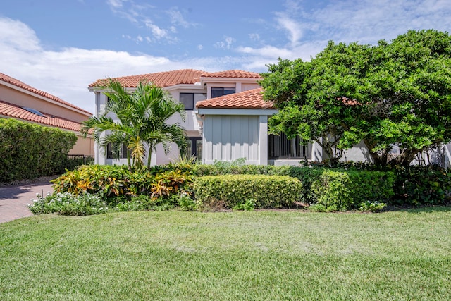 exterior space featuring a front yard