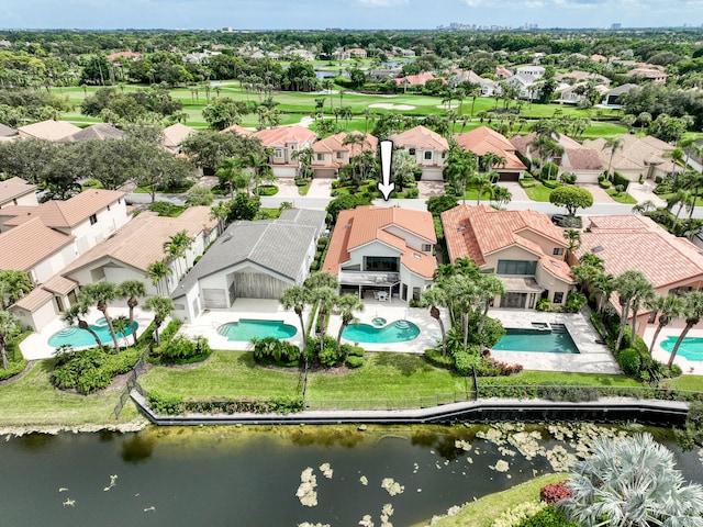 bird's eye view with a water view