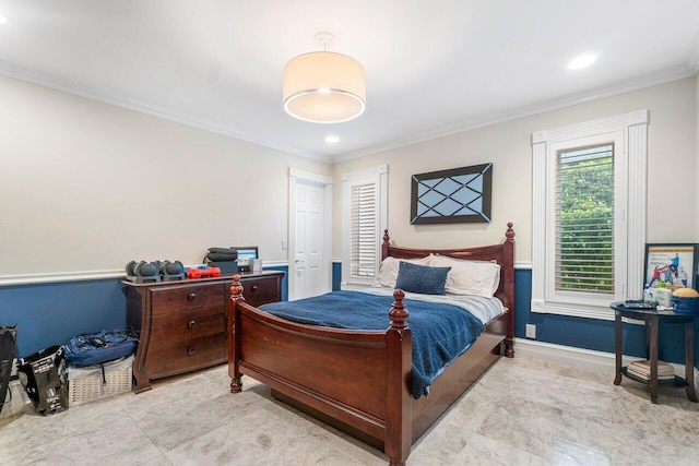 bedroom with crown molding