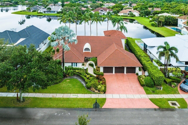 drone / aerial view with a water view