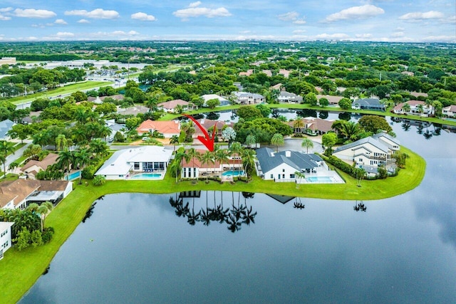 birds eye view of property featuring a water view