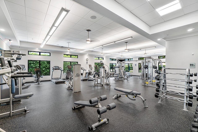 exercise room with a drop ceiling