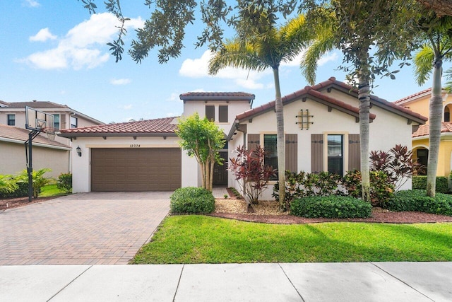 mediterranean / spanish-style home featuring a garage