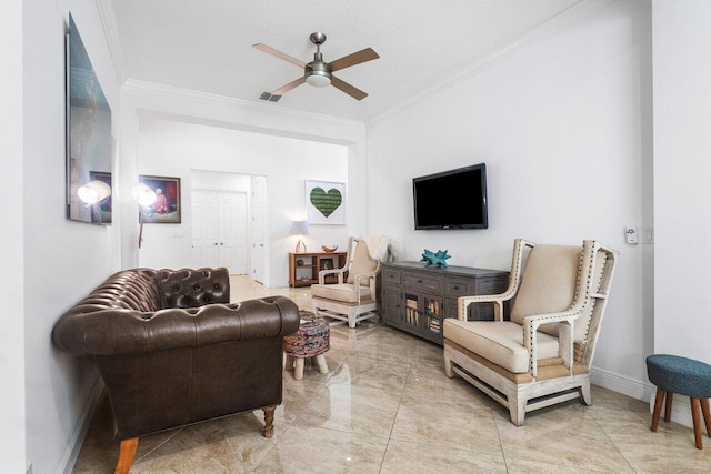 living room with a textured ceiling, ornamental molding, and ceiling fan