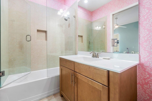 bathroom featuring independent shower and bath, vanity, and ceiling fan