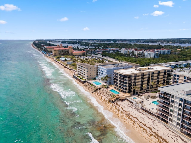 bird's eye view with a view of the beach and a water view