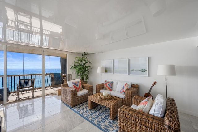 living room featuring a water view