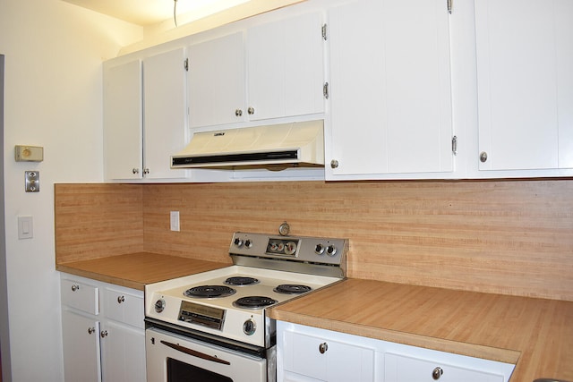 kitchen with white cabinetry, electric range, and backsplash