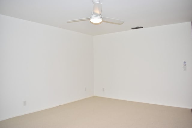 spare room featuring ceiling fan