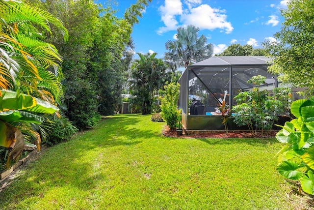 view of yard featuring a lanai