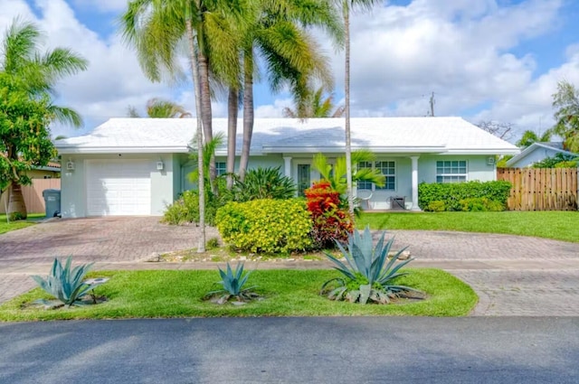 single story home featuring a garage