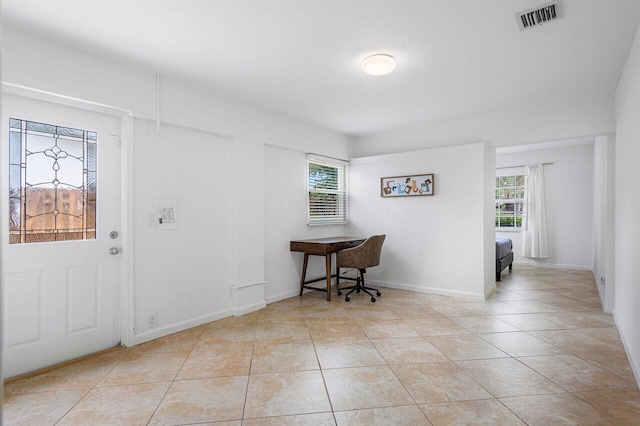 view of tiled foyer