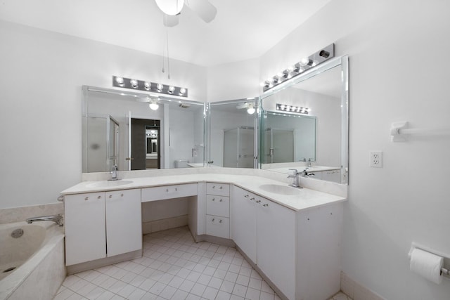 bathroom with tile patterned floors, ceiling fan, and vanity