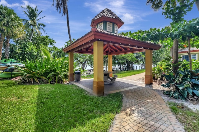 surrounding community featuring a gazebo and a yard