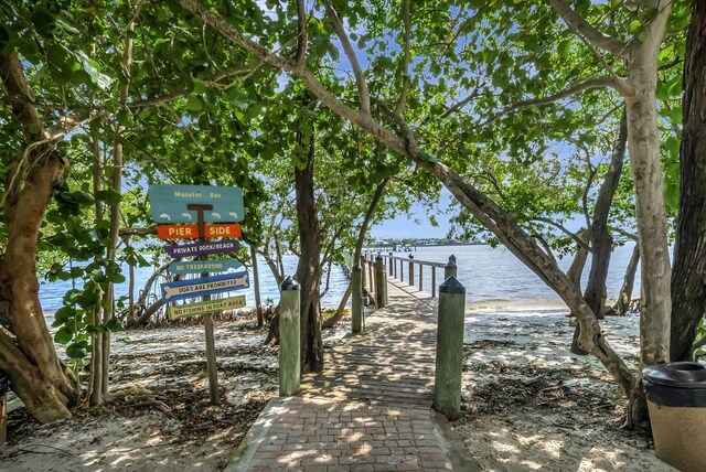 view of dock with a water view