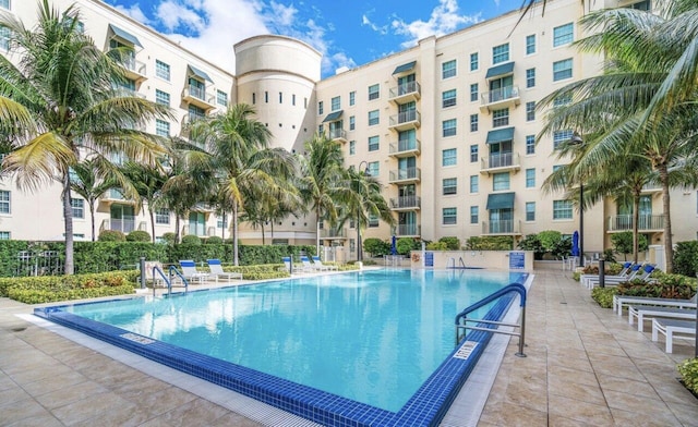 view of swimming pool featuring a patio